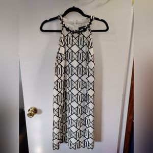 Nine West size 4 dress. White with black design. Black gems on collar. Back zipp
